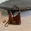 Bolsa Saco Grande de Camurça Estilo Retrô Feminina 2026 Novo Estilo para Trabalho e Dia a Dia Bolsa de Ombro Único Bolsa Tote Transversal