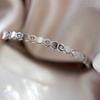 Pulsera de acero de titanio europea y americana transfronteriza de panal de diamante brillante para mujer, pulsera con hebilla que no se desvanece, aliento de bebé dorado, joyería nueva