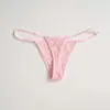 Comercio exterior transfronterizo hueco transparente encaje europeo y americano tirante fino nuevos pantalones T algodón transpirable cómodo tanga para mujer