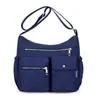 Bolsa transversal de nylon de grande capacidade, novo estilo para mulheres, bolsa de ombro popular para mulheres de meia-idade, bolsa casual para mães, bolsa de tecido 2026