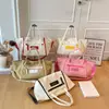 Bolsa de lona transfronteiriça para mulheres, bolsa de grande capacidade para o dia a dia, nova versão coreana de verão, bolsa de mão casual, bolsa de ombro e transversal