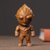 Talla de sándalo verde Ultraman caracol tortuga de dinero cabeza de tigre bola de salud pieza de mano escritorio mascota de té artesanías adornos