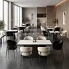Mesa de travertino minimalista de lujo ligero sillas de terciopelo con respaldo suave estilo minimalista italiano restaurante occidental uso doméstico mesa redonda de madera maciza con borde envuelto