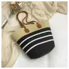 Bolso de Paja para Vacaciones en la Playa para Mujer, Moda Nueva Primavera/Verano 2026 Bolso de Hombro Tipo Canasta Tejida Hecho a Mano