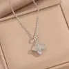 Collar Cruzado de Acero de Titanio Flor de Cuatro Hojas, Versátil y de Alta Gama, Cadena para Clavícula que no se Desvanece, Diseño de Nicho, Elegante Joyería de Cadena para el Cuello