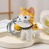Lindo gato de simulación resina mascota gato llavero colgante para mochila de estudiante llavero para llaves de coche muñeca para niños