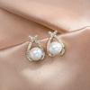 Nuevos aretes de tuerca de aguja de plata S925 de moda, aretes populares versátiles, joyería de temperamento simple y fresco de hadas al por mayor