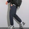Pantalones de chándal pesados para hombre, primavera y otoño 2025, nuevos y modernos, holgados, casuales, con retazos, engrosados, deportivos, tipo jogger