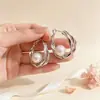 Pendientes ear cuff de perlas de doble capa con temperamento exagerado, aretes de moda de lujo ligero de alta gama, versátiles, aretes retro de nicho, joyería para orejas de moda