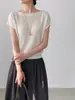 Top de punto Goming estilo coreano con hombros descubiertos y mangas acampanadas para mujer, nueva camiseta de punto de Guangzhou Thirteen Lines AN428