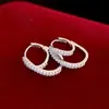 Aguja de plata transfronterizos de alta calidad cuentas redondas geométricas de plata pendientes de corazón pendientes de personalidad de nicho pendientes de estilo frío venta al por mayor