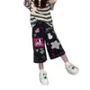 Jeans lavados estilo americano de nicho con graffiti pintado a mano de dibujos animados para hombres y mujeres, pantalones divertidos holgados de pierna ancha