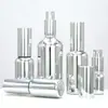 En stock galvanizado en oro subbotella cosmética botella de spray de vidrio botella de aceite esencial cabeza de bomba de presión botella de loción botella de crema facial