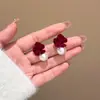 Pendientes rojos de Año Nuevo para mujer, otoño e invierno, con lazo, con clip para las orejas, nuevos pendientes de perla de Año Nuevo 2024