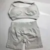 En Stock Dfyne Mismo Estilo Conjunto de Yoga de Alta Elasticidad Sujetador Halter y Conjunto de Shorts Conjunto de Yoga Fitness sin Costuras