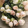 Al por mayor en stock 9 rosas de simulación ramo falso individual decoración de boda europea sala de estar flores de simulación de alta gama transfronterizas