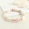 Nova Pulseira de Cerâmica Jingdezhen Trevo de Quatro Folhas, Pulseira de Contas Fresca de Luxo Discreto, Atacado para Barracas, Joias de Amizade