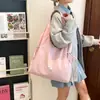 Bolso Cubo Casual de Gran Capacidad Estilo Coreano para Mujer Primavera 2026 Nuevo Bolso de Hombro Simple de Tela de Nylon Bolso de Compras