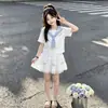 Conjunto de Falda Estilo Universitario 2026 Verano Nuevo Dulce y Lindo Cuello Marino Manga Corta Falda con Lazo Conjunto de Dos Piezas