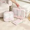 Set de organizadores de viaje de dibujos animados, incluye tres piezas: un organizador de equipaje, un organizador de ropa y un organizador de lencería, con una bolsa de malla portátil