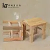Venta al por mayor de fábrica Taburete pequeño Hogar Madera maciza Taburete bajo Taburete cuadrado pequeño Taburete para mesa de café Estudiante Infantil Taburete de tronco simple para cambiarse los zapatos
