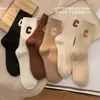 Calcetines bordados con la letra C, calcetines de lana para mujer hasta la pantorrilla, engrosados para abrigar en otoño e invierno, mezcla de cachemira, estilo preppy, calcetines largos para invierno