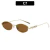 Gafas de sol metálicas de marco pequeño estilo coreano de moda 2026 con un toque de alta gama, estilo influencer moderno, protección UV