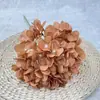 Valle de Huaxi 2026 Nueva Colección: Arreglos en tonos marrones, Serie de 2.5 Yuan, Venta al por mayor de flores artificiales para lugares de boda