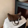 Bolso hobo de mezclilla azul vintage para mujer 2026 nuevo nicho patchwork de un solo hombro color block tipo almohada versión coreana