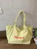 Bolsa de Lona Casual Tote de Grande Capacidade Leve com Estampa de Letra Estilo Coreano para Mulheres Novo Modelo 2026 Bolsa de Ombro Único
