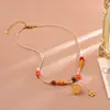 Colar multi-tesouro com contas coloridas de pedra natural com tema de caqui para mulheres, estilo resort de nicho, corrente para clavícula com peça de concha removível