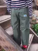 Pantalones de trabajo para niños AnGu YuanBao 2026 nuevo modelo de otoño pantalones largos deportivos para exteriores para niñas y niños pequeños pantalones de pierna recta