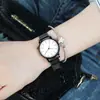 Shinoya xiaoya versión coreana de moda simple estudiantes retro reloj de hombre correa impermeable reloj de pareja 1251 red