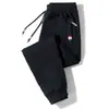 Calça esportiva masculina outono e inverno 2023 Nova calça de malha casual solta comprimento no tornozelo