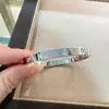 Pulsera de amor de alta calidad CNC estrecha mediana ancha estilo nuevo gruesa chapada en oro rosa de 18 quilates pulsera de muñeca para pareja transfronteriza