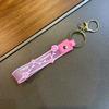 En stock, llavero con colgante de flor pequeña, nuevo colgante de color gelatina, correa de mano, pulsera de cuerda de cuero, pequeño llavero de regalo.