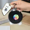 Chaveiro de Pelúcia com Rosto Sorridente e Flor Colorida Boneca Bola de Pelo Fofa Pingente para Bolsa Mochila Carro