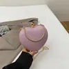 Bolso de Mano Francés para Mujer Clutch Bolso de Noche 2026 Nuevo Bolso de Cadena con Corazón Versátil Elegante de Hombro Cruzado Bolso de Corazón Melocotón