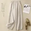 Conjunto de verano de algodón y lino para mamá, nuevo y elegante conjunto de dos piezas para mujer 2025: camisa bordada de lino y pantalones de pierna ancha
