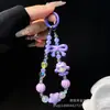 Muñeca de Dibujos Animados Popular con Cuentas Cadena para Teléfono Móvil Colgante para Bolso de Cristal para Mujer Cordón Antirrobo para Teléfono Móvil Llavero de Mano