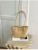 2026 Nuevo Bolso Cubo Tejido Simple de Hombro Único Bolso Madre-Hijo Textura de Nicho Bolso de Axila Bolso de Mano para Mujer