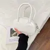 Bolso de mano de color liso estilo coreano para mujer, nueva colección de verano 2025, bolso con forma de concha moderno y chic, bolso cruzado moderno y casual