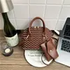 Bolsos de mujer populares de este año 2026 nuevo modelo de lujo ligero moda para mujer bolso de hombro cruzado para el día a día bolso simple tipo concha