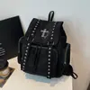 Mochila de Gran Capacidad para Mujer 2026 Nuevo Remache Cruzado Casual Nicho Estudiante Mochila de PU Doble Hombro Bolsa Escolar