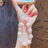 Muñeca creativa de niña cadena para teléfono móvil con cuentas llavero colgante lindo colgante para llavero de mochila escolar regalo venta al por mayor