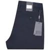 Pantalones casuales de alta gama de algodón Tencel microelásticos para hombre, verano, finos, de negocios, sin planchar, antiarrugas, rectos, corte slim, pantalones para hombre, talla grande, moda