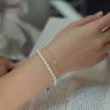 Pulsera de plata esterlina S925 nueva japonesa y coreana para mujer, mini trébol de cuatro hojas, nicho ligero, diseño de lujo de alta gama, temperamento apilado.
