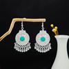 Pendientes geométricos redondos de estilo étnico transfronterizo europeo y americano, con borlas largas y atracciones turísticas retro bohemias.