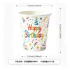 Decoraciones para fiesta de cumpleaños infantil con temática de arcoíris, que incluyen platos de papel desechables, pancartas, banderines y artículos decorativos
