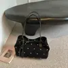Hebilla de cinturón de lunares de moda europea y americana transfronteriza estilo coreano bolso de mano simple para el día a día bolso tote de hombro principios de otoño 2026